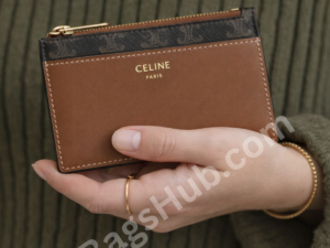 premium-inspired-compact-card-holder-wallet-held-in-female-hand-with-zip-pocket-brown-leather-and-monogram-design