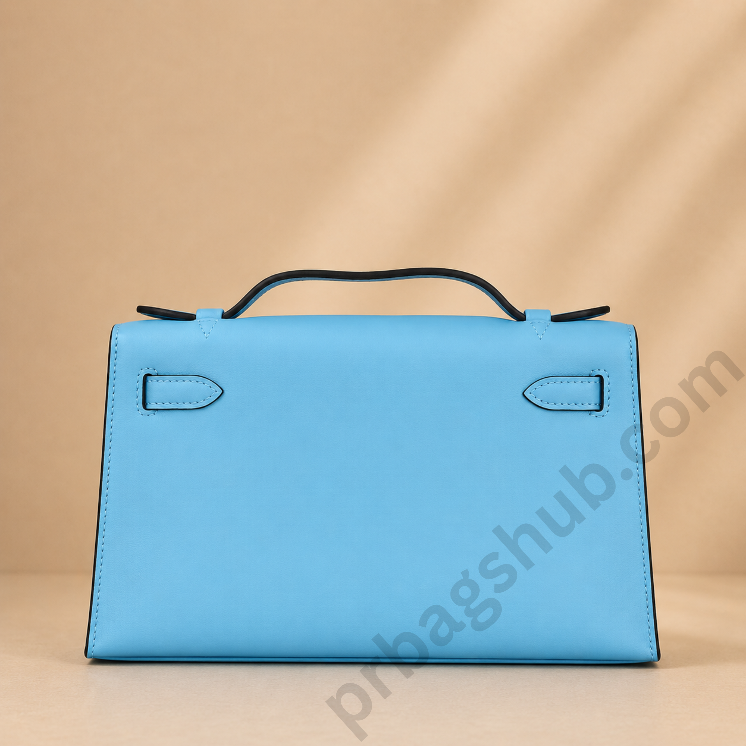 light-blue-kelly-style-top-handle-handbag-back-view-with-smooth-finish-and-structured-design