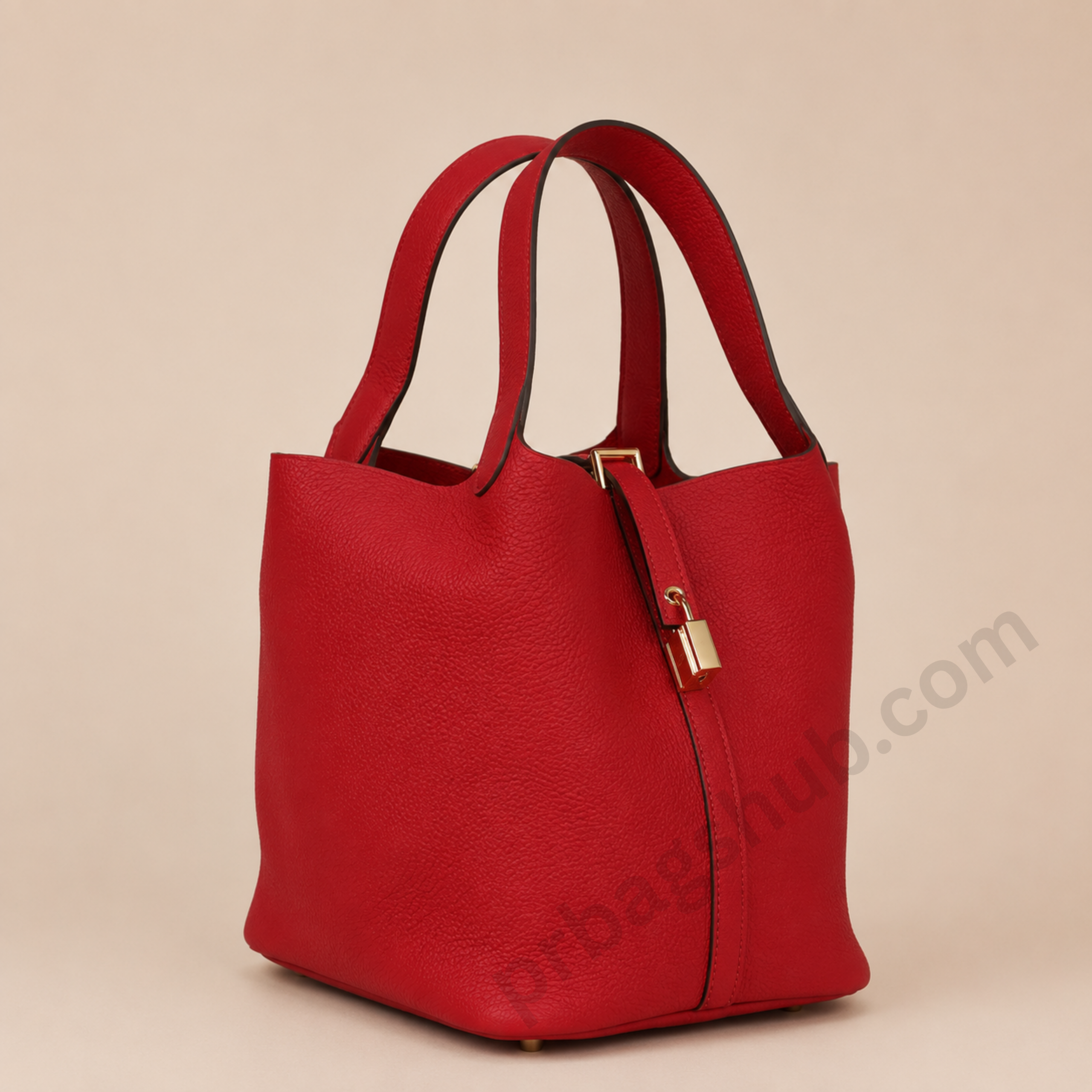 red-picotin-style-bucket-bag-angled-side-view-with-gold-lock-detail