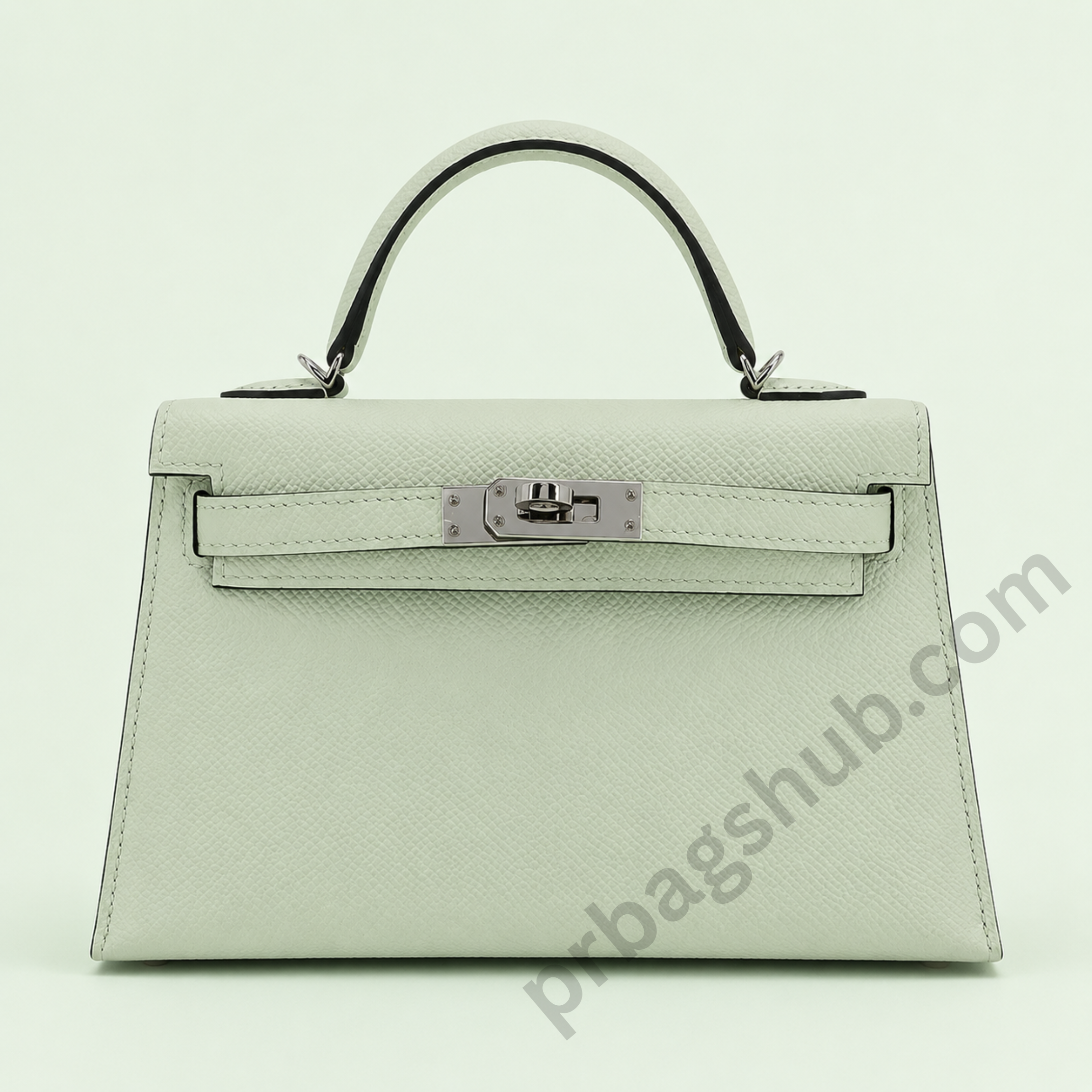 mint-green-kelly-style-top-handle-handbag-front-view-with-silver-turn-lock-on-light-background