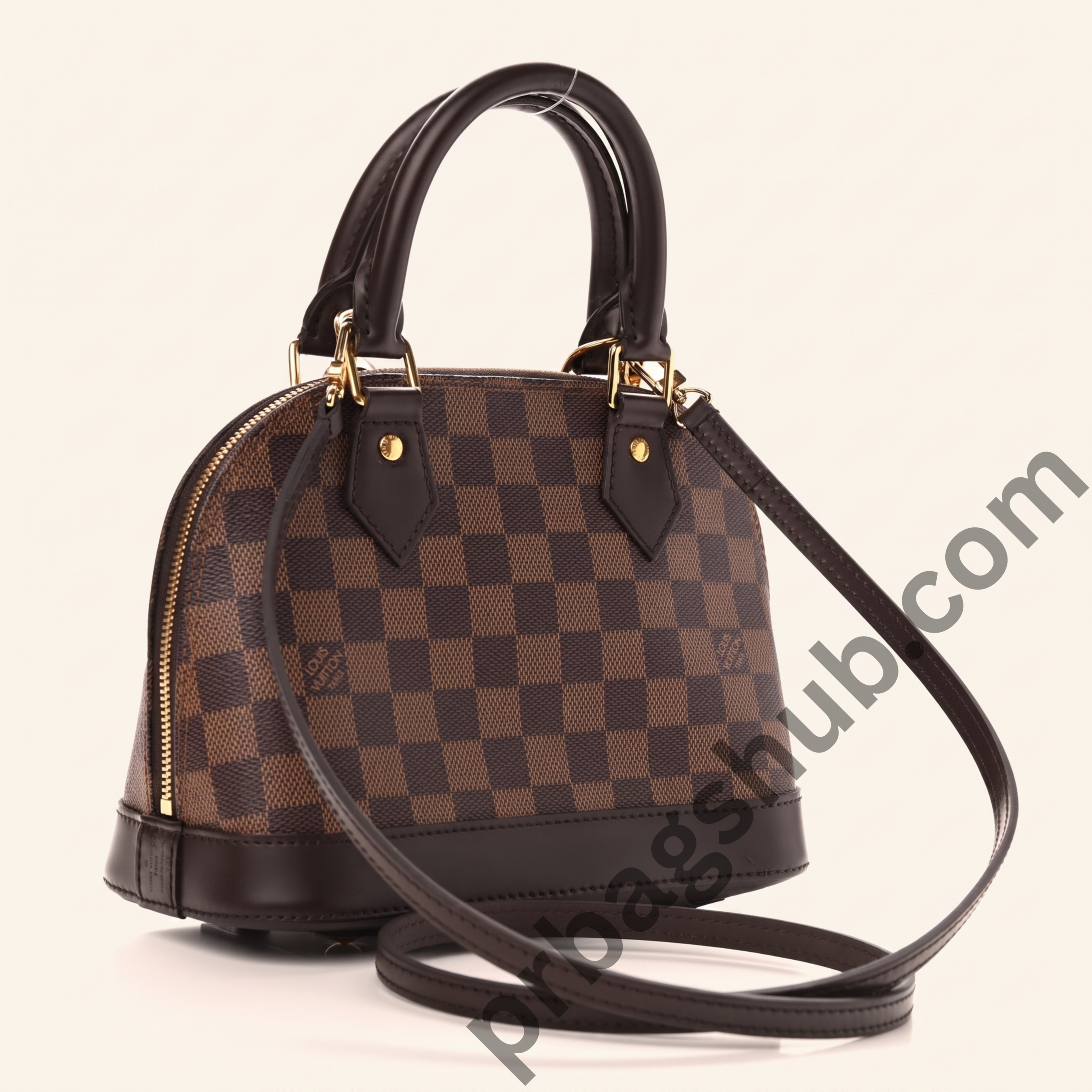 louis-vuitton-alma-bb-inspired-crossbody-handbag-angled-view-with-brown-checkered-canvas-adjustable-strap-and-gold-hardware-white-background